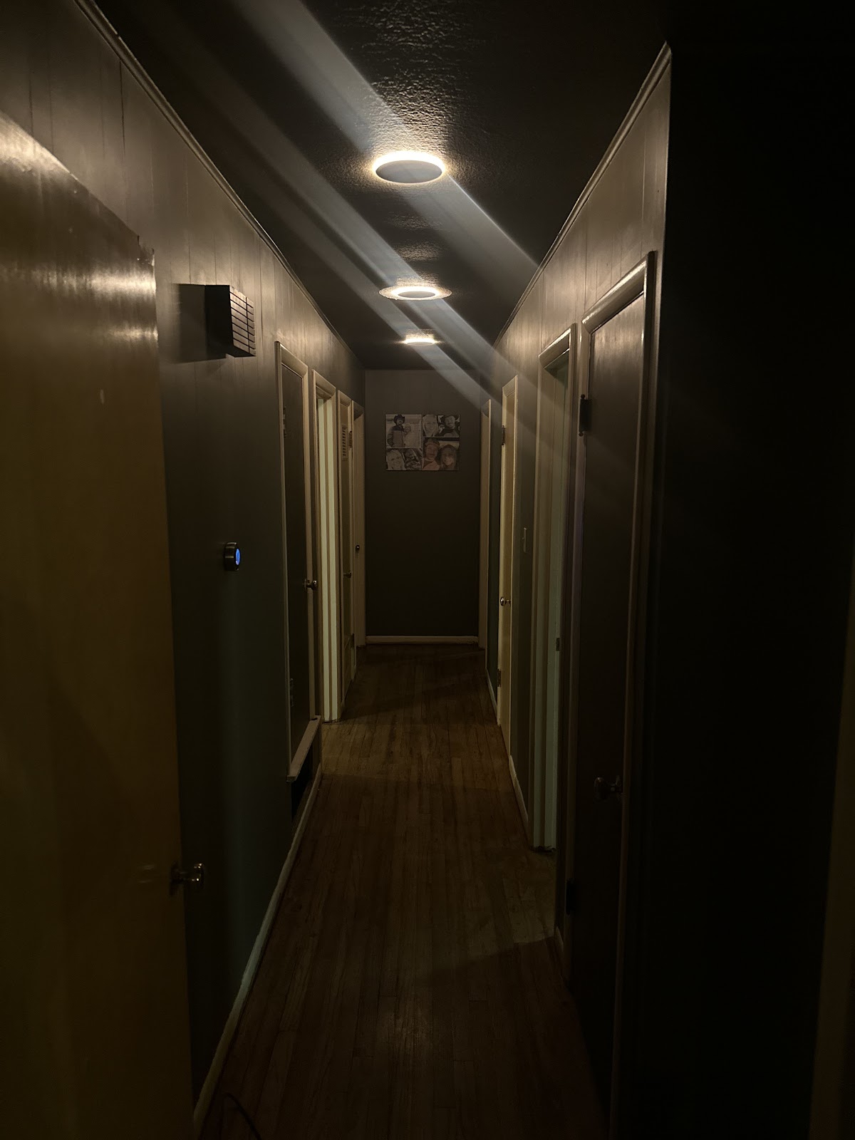Recessed lighting fitted into a hallway ceiling