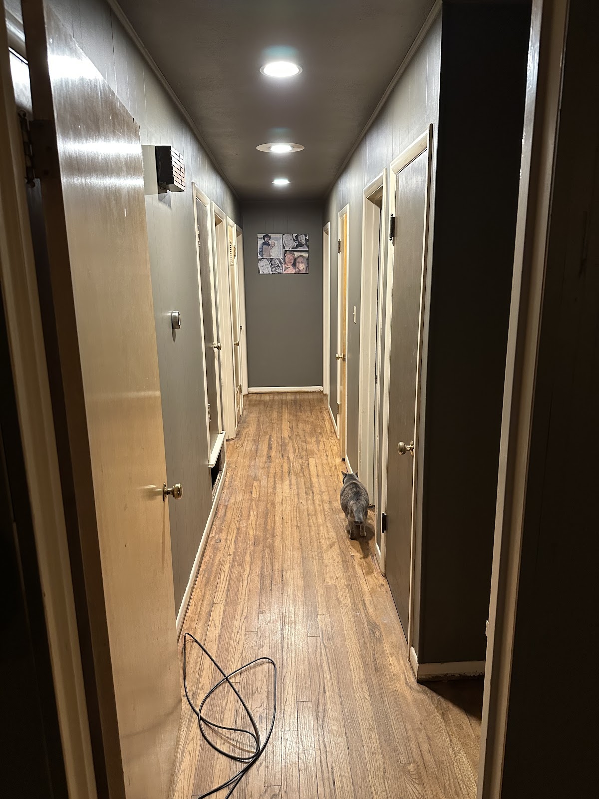 Recessed lighting installed along an interior hallway